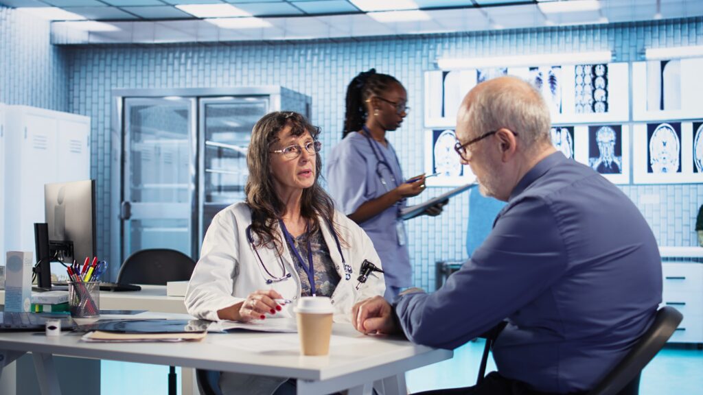 female-doctor-clinic-evaluates-man-cognitive-function-reflex