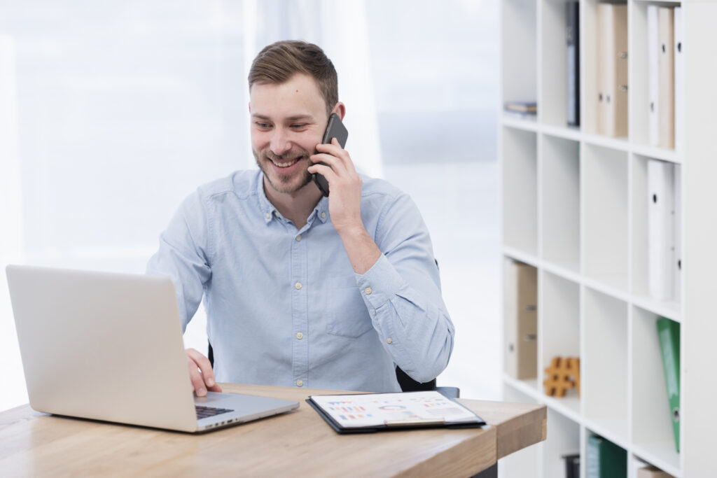 smiley-man-working-laptop