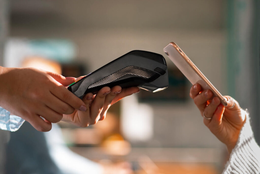 person-paying-with-nfc-technology-restaurant