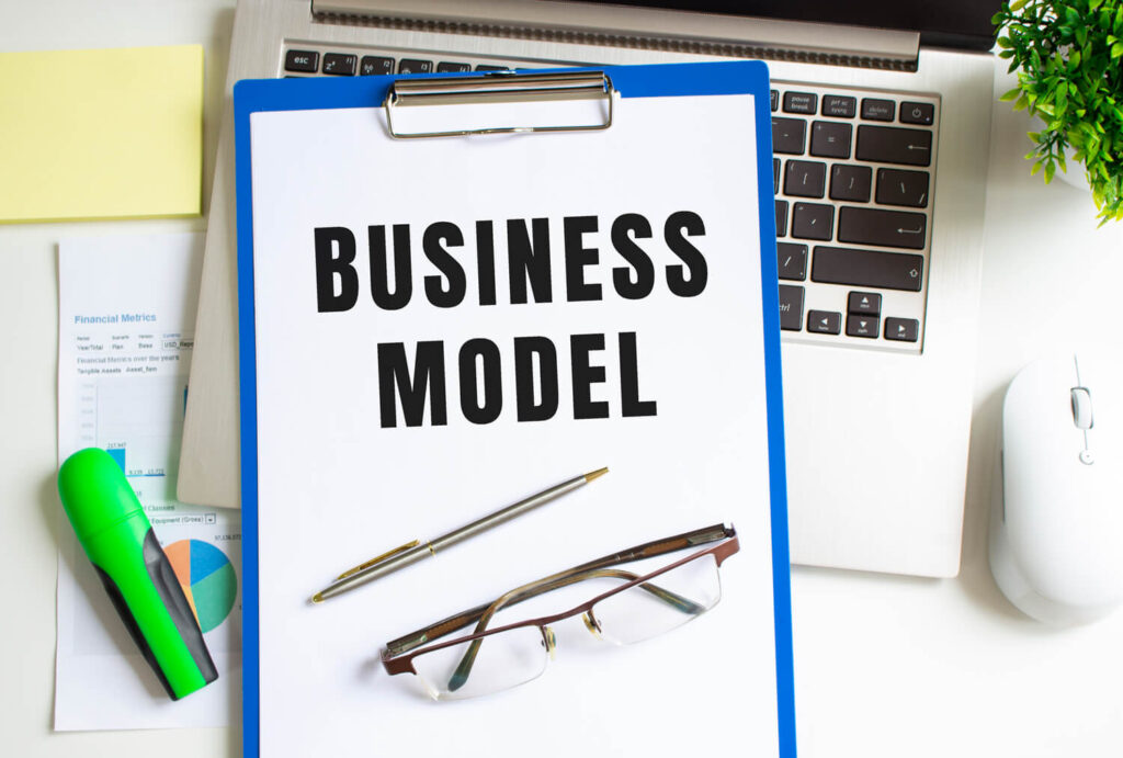 workplace-with-laptop-folder-graph-table-folder-with-text-business-model