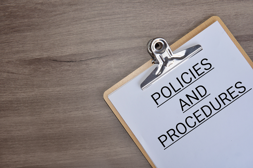 paper-clipboard-with-text-policies-procedures-table-with-copy-space-text