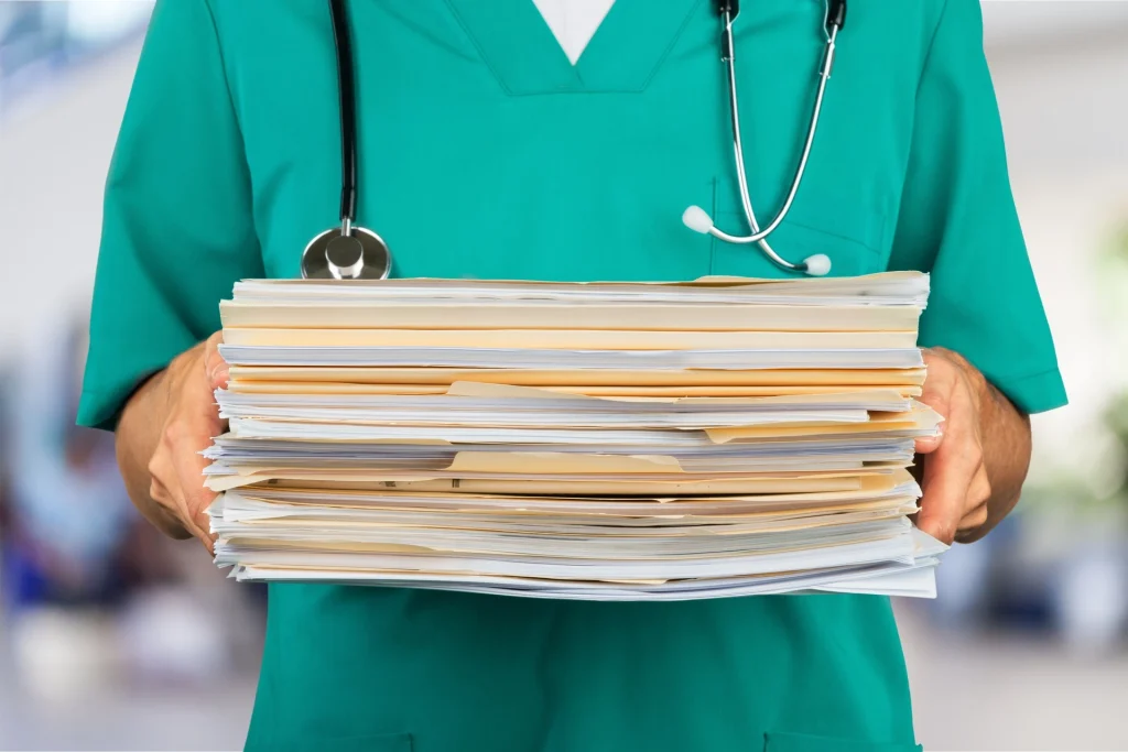 doctor-holding-medical-files